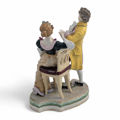 Late 19th century Sitzendorf porcelain courting couple figurine