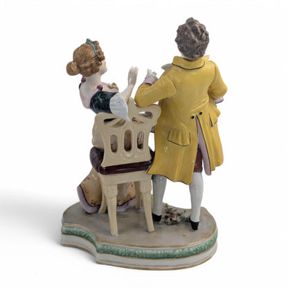 Late 19th century Sitzendorf porcelain courting couple figurine