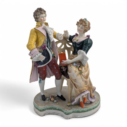 Late 19th century Sitzendorf porcelain courting couple figurine