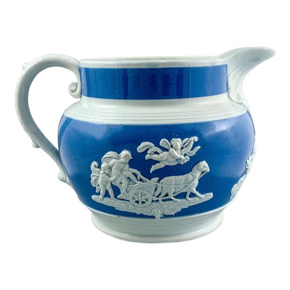 1810’s Chetham and Woolley Georgian blue jasperware cider jug featuring putti