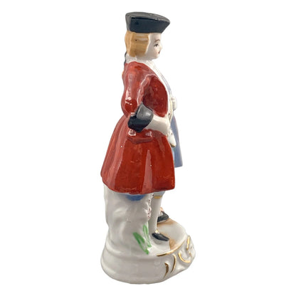 German porcelain matching figurines – Georgian gentleman and lady on gilded bases