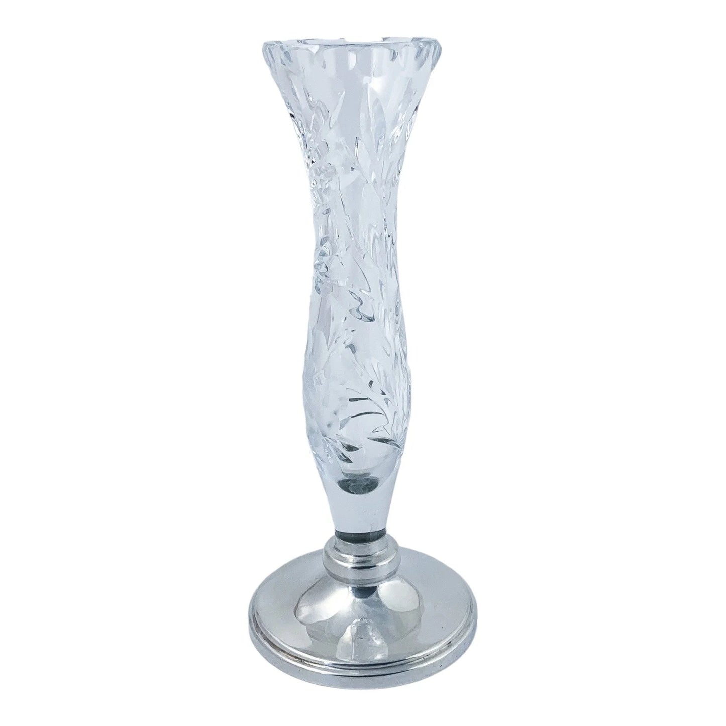 Vintage crystal flower vase resting on a sterling silver stepped round foot
