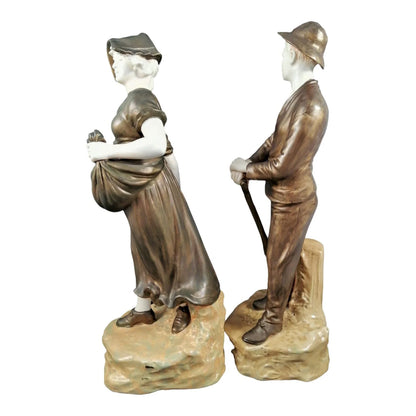 Pair of Art Nouveau Theodore Schoop for Bernard Bloch porcelain figurines, farming peasant couple