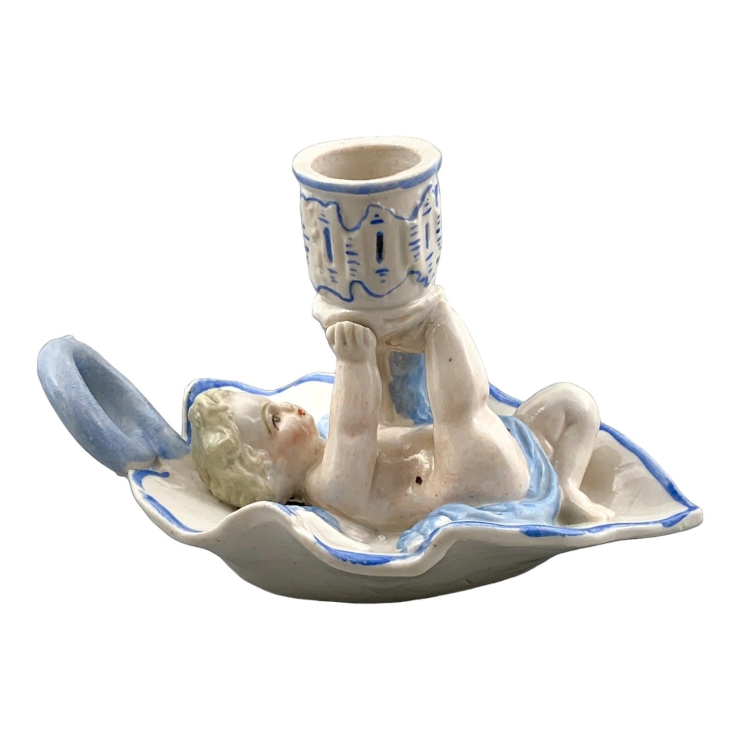 Georgian softpaste porcelain and creamware cherub candle chambersticks, putti on wyvern and leaf