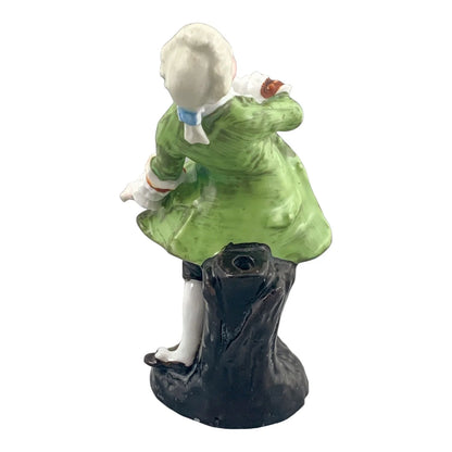 19th century German porcelain matching figurines – Regency gentleman and lady with flower garland
