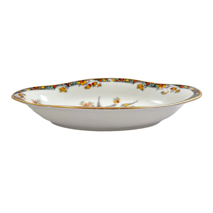 Vintage French Limoges porcelain candy dish with paradise bird motif