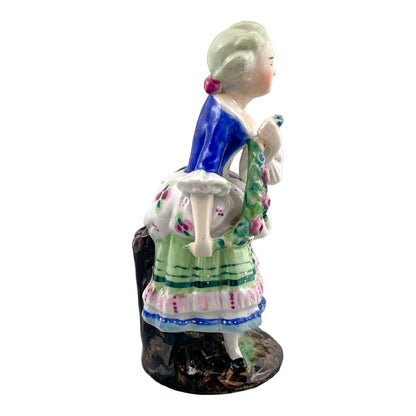 19th century German porcelain matching figurines – Regency gentleman and lady with flower garland