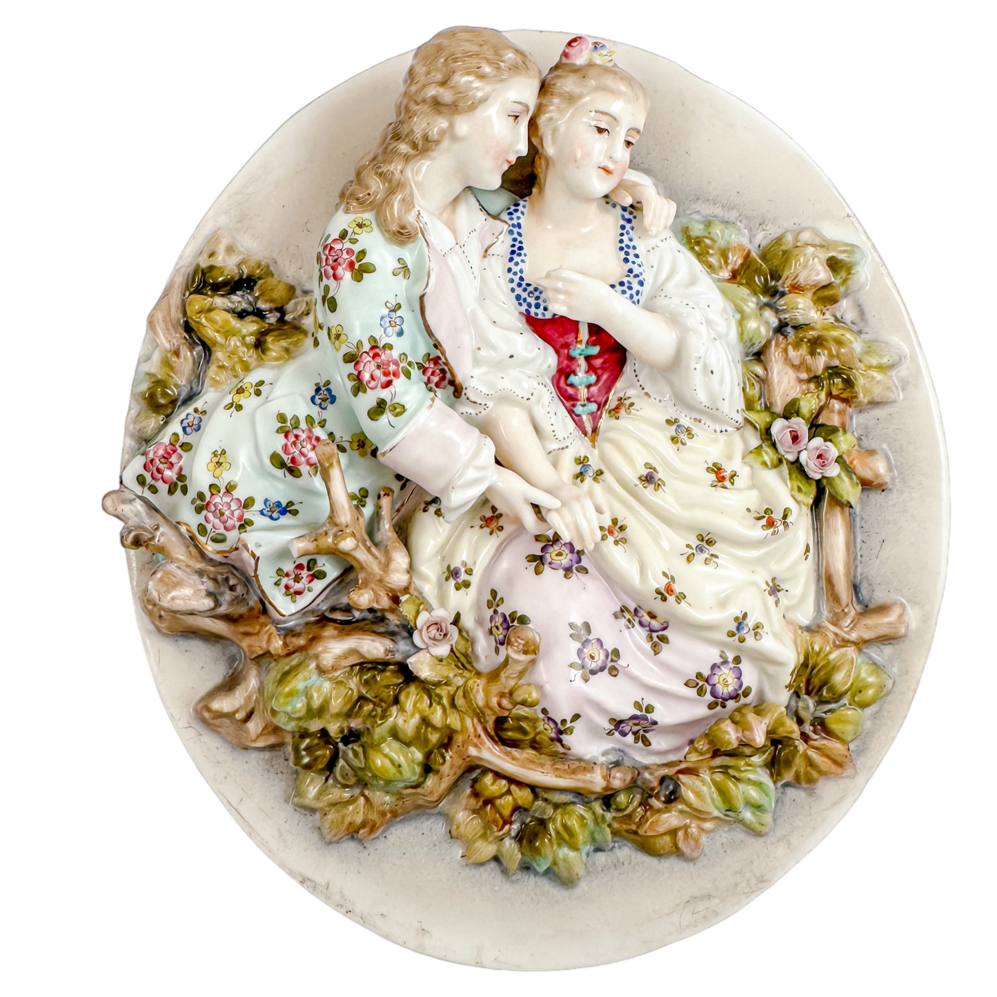 Pair early 19th Century porcelain Meissen style continental wall plaques, romantic scenes with lovers