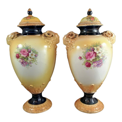 Pair of mid-19th Century KPM floral porcelain gilt lidded urns/vases in Neoclassical style