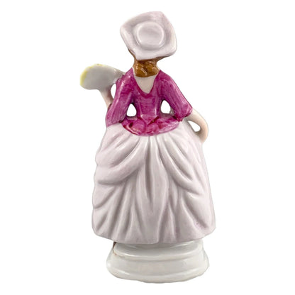 German porcelain matching figurines – Georgian gentleman and lady on gilded bases