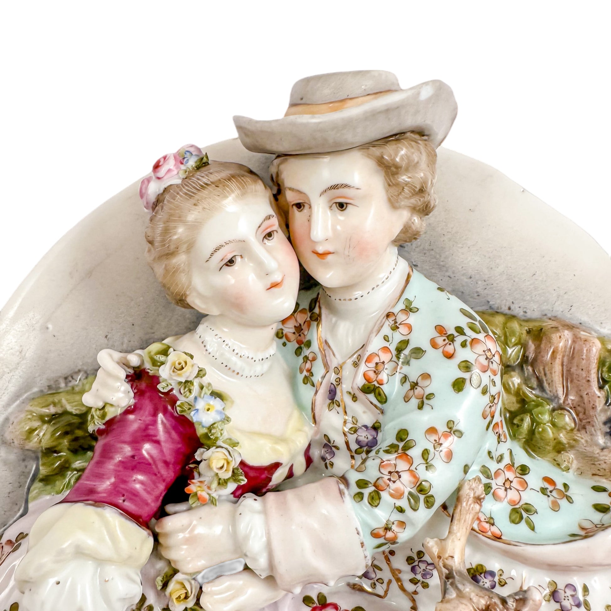 Pair early 19th Century porcelain Meissen style continental wall plaques, romantic scenes with lovers