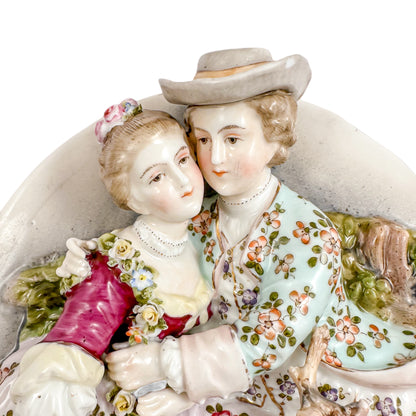 Pair early 19th Century porcelain Meissen style continental wall plaques, romantic scenes with lovers