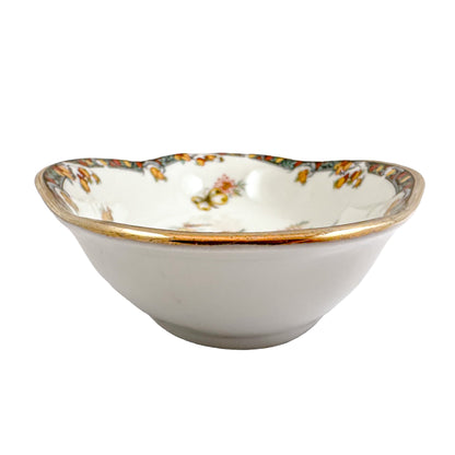 Vintage French Limoges porcelain candy dish with paradise bird motif