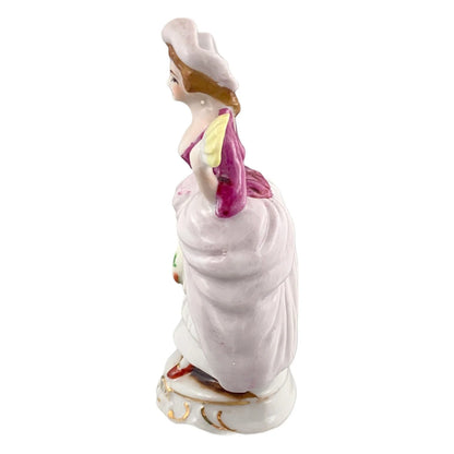 German porcelain matching figurines – Georgian gentleman and lady on gilded bases