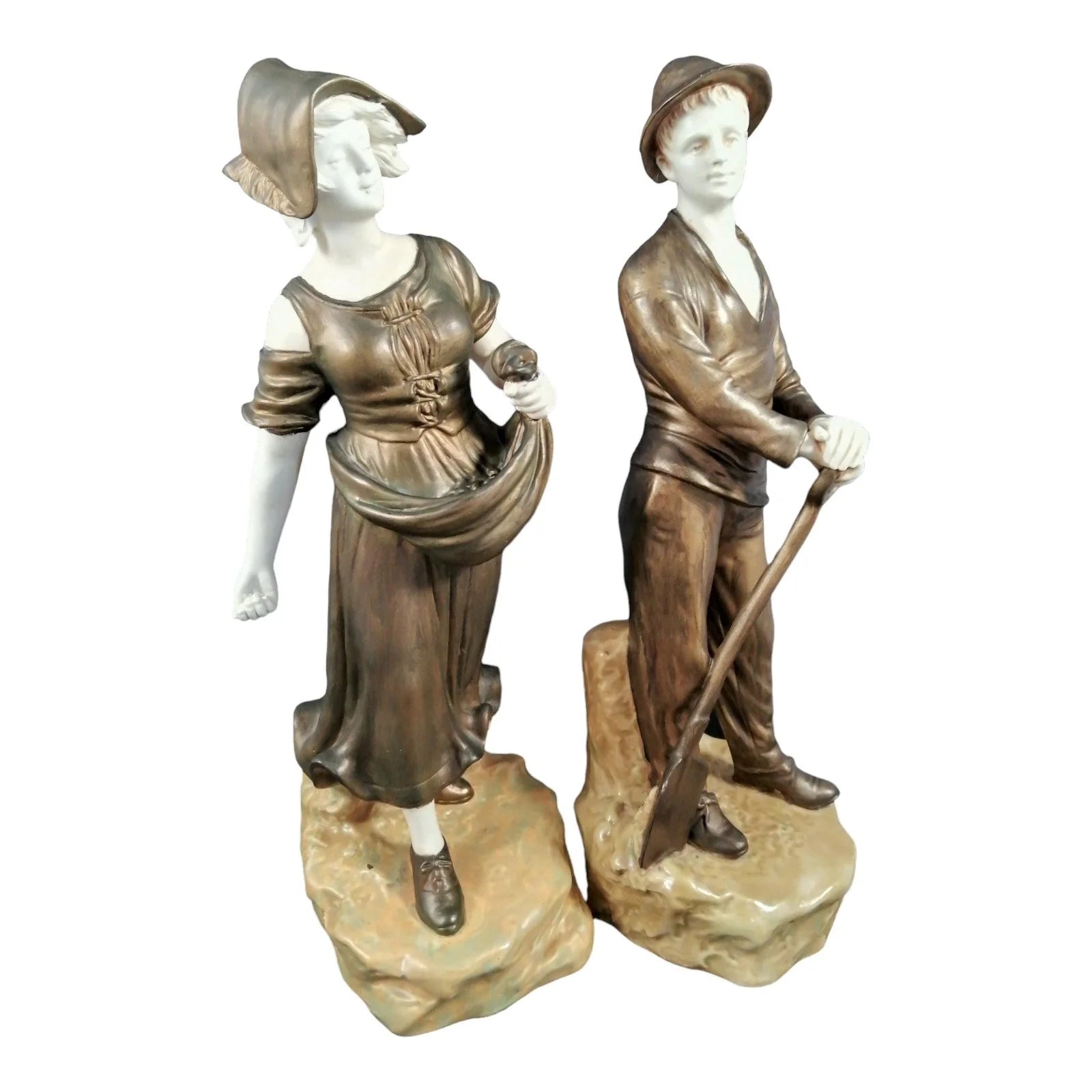 Pair of Art Nouveau Theodore Schoop for Bernard Bloch porcelain figurines, farming peasant couple