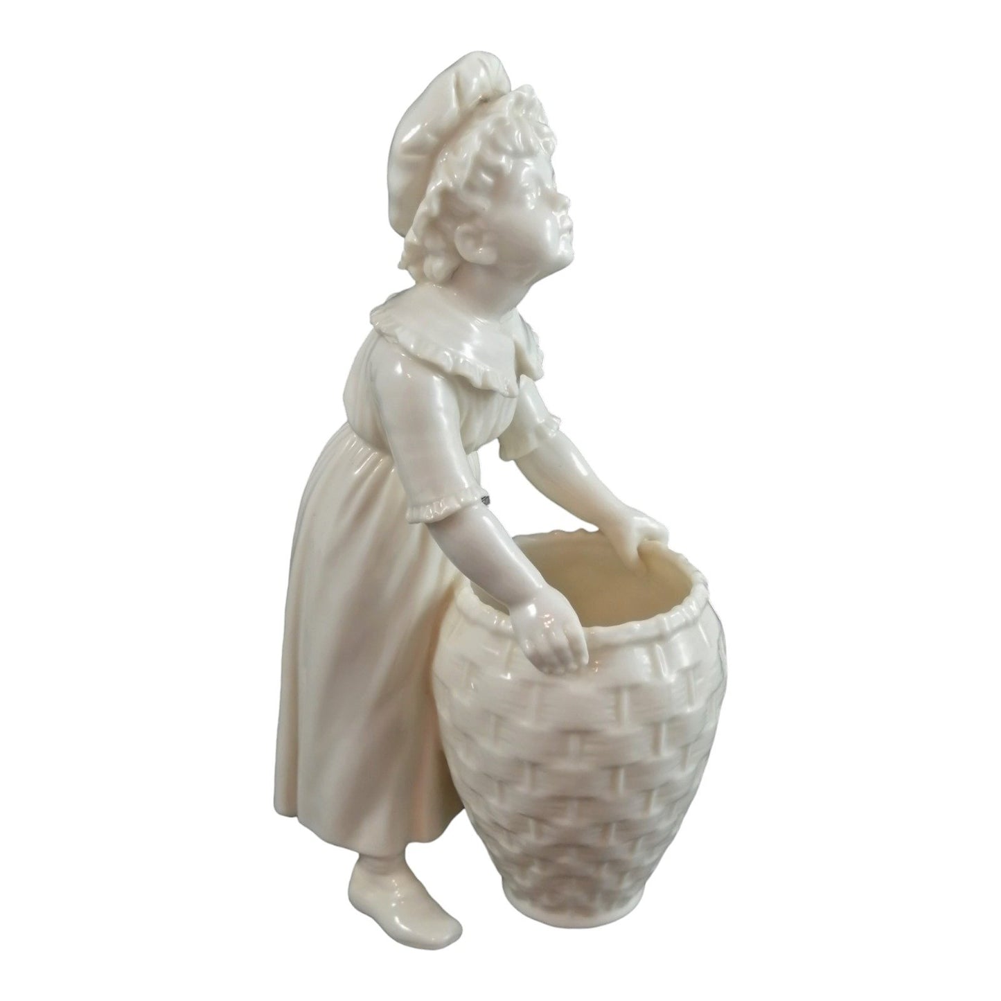 Victorian Royal Worcester "Kate Greenaway" porcelain figurine of young girl with basket modelled by James Hadley