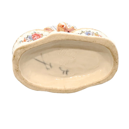 Rococo German Dresden porcelain double open bonbon / salt cellar, "Girl with baskets"