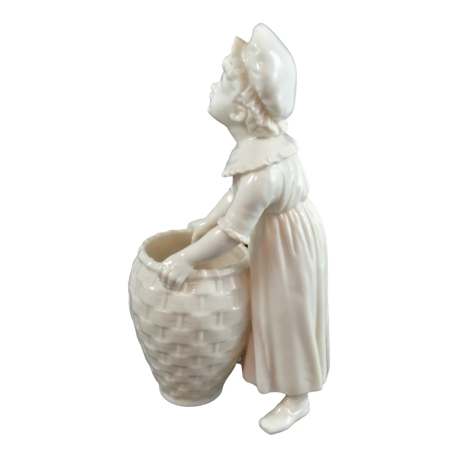 Victorian Royal Worcester "Kate Greenaway" porcelain figurine of young girl with basket modelled by James Hadley