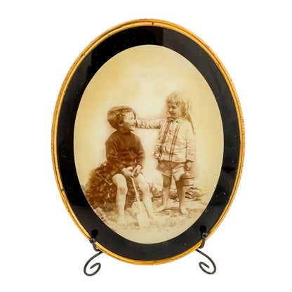 Victorian pair of wall ambrotype photos in gilt brass frames of small children “Bless my heart how cold it is”