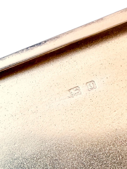 Large Art Deco George V engine-turned cigarette case with gold washed interior