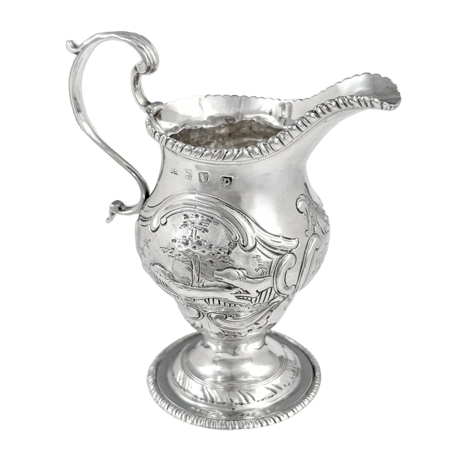 George III sterling milk jug on pedestal foot with hunting scenes, Walter Brind, 1770
