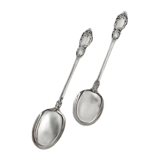 Danish solid silver pair dessert spoons with rich foliate design
