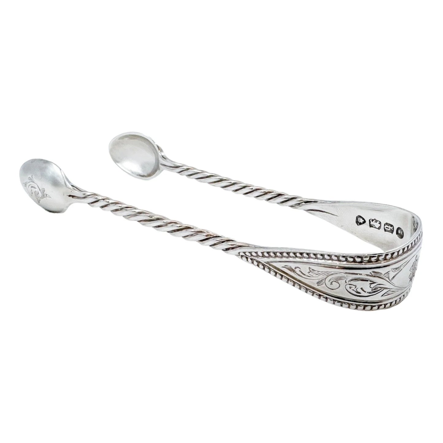 Early Victorian sterling silver sugar tongs with twisted arms and foliate engraving