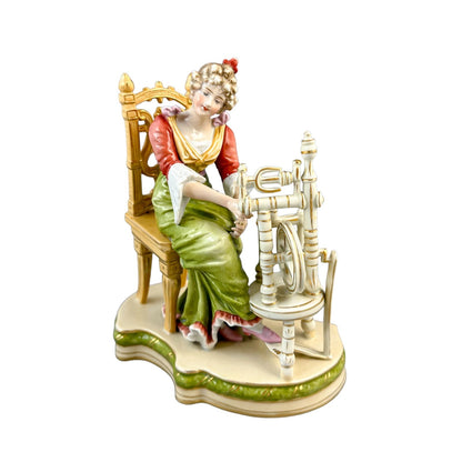 Sitzendorf porcelain figurine, "Woman at Spinning Wheel"