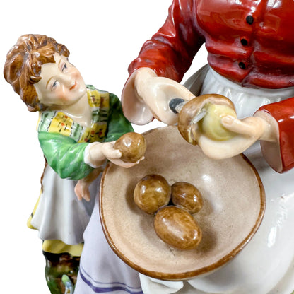 German 1890's Thuringian porcelain figurine of woman peeling potatoes