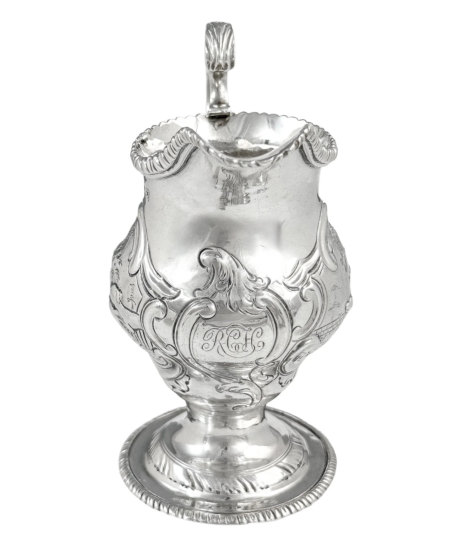 George III sterling milk jug on pedestal foot with hunting scenes, Walter Brind, 1770