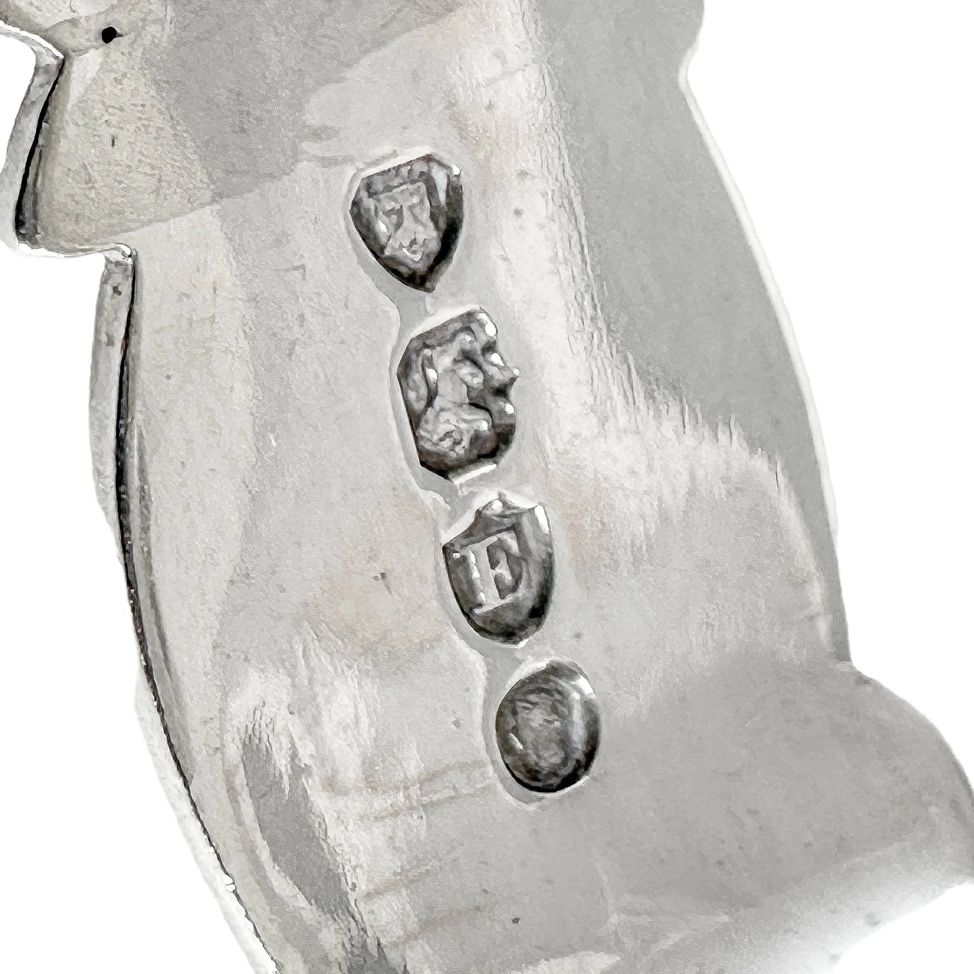 Large Victorian sterling silver sugar tongs with pierced ropework arms and shell terminals