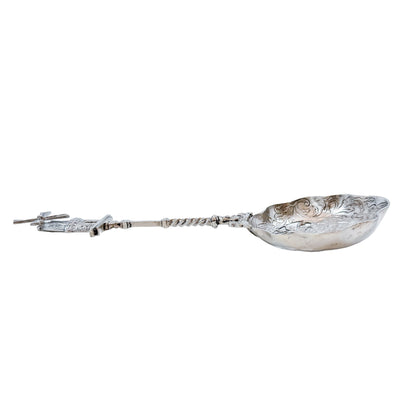 19th century Dutch silver tea strainer spoon with pastoral scene and windmill finial