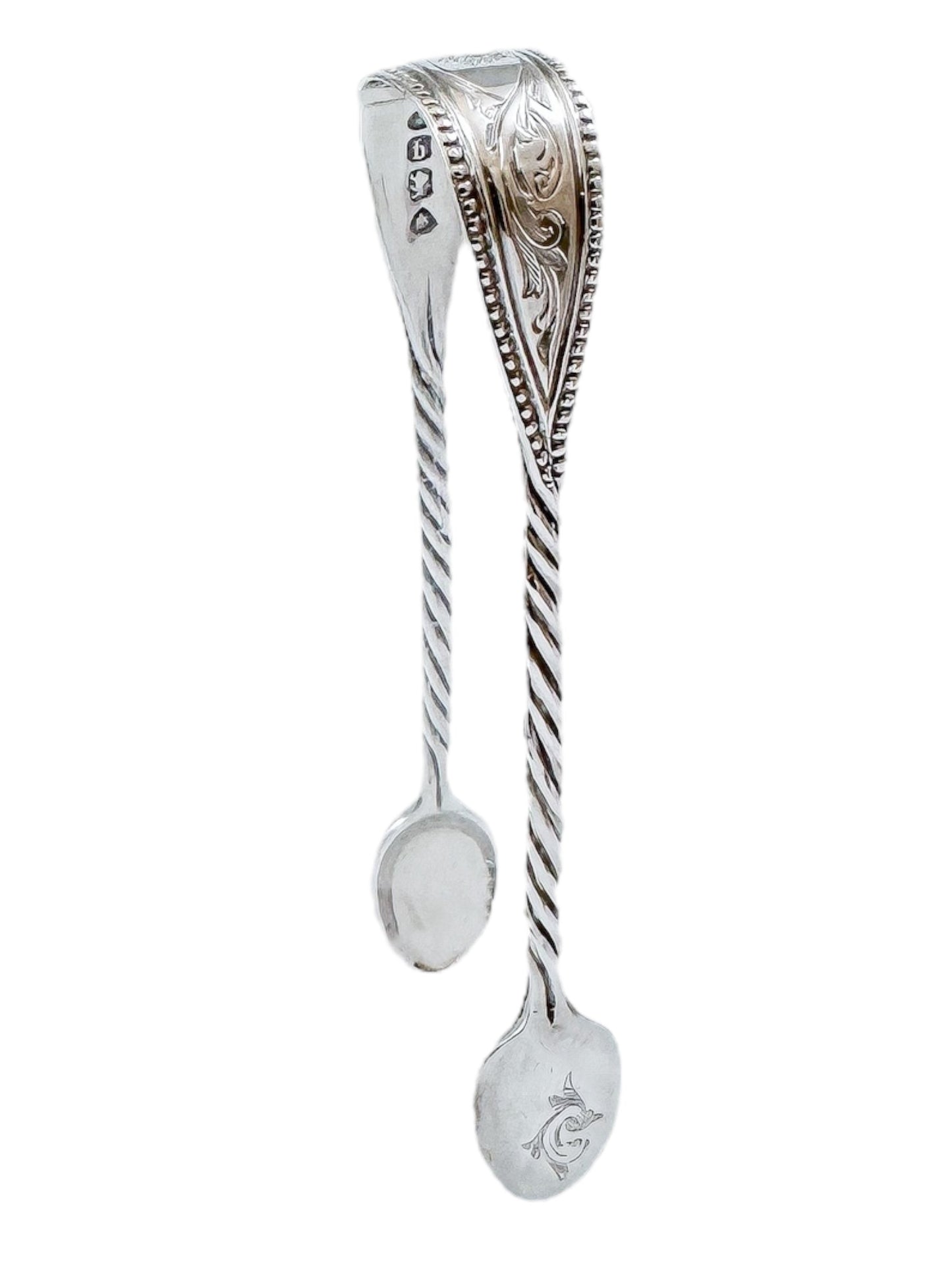 Early Victorian sterling silver sugar tongs with twisted arms and foliate engraving