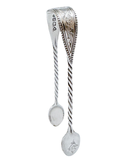 Early Victorian sterling silver sugar tongs with twisted arms and foliate engraving