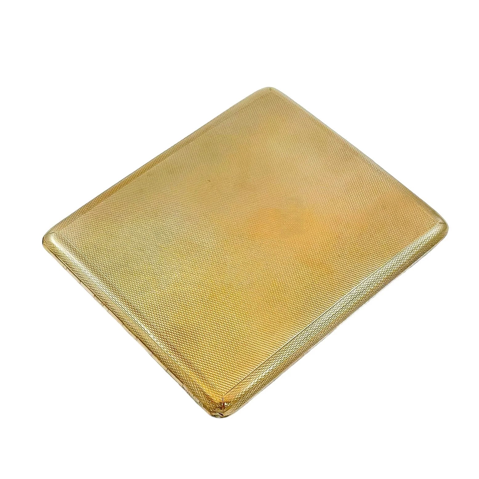 Art Deco 9 kt yellow gold large engine-turned bevelled cigarette case, 93 g