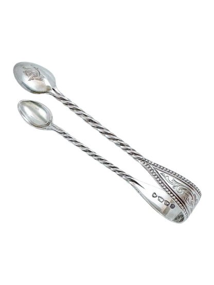 Early Victorian sterling silver sugar tongs with twisted arms and foliate engraving