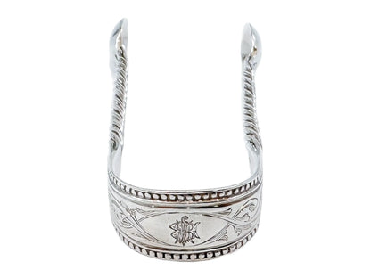 Early Victorian sterling silver sugar tongs with twisted arms and foliate engraving