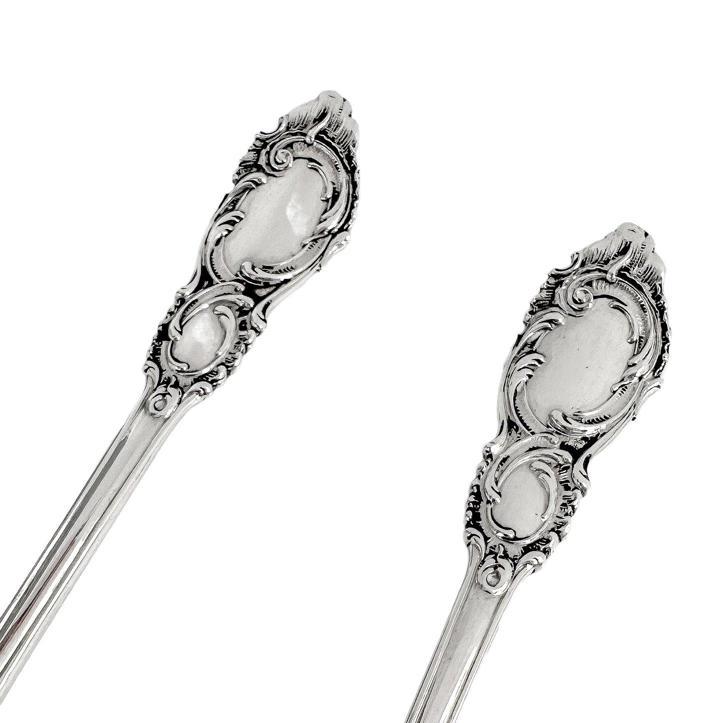 Danish solid silver pair dessert spoons with rich foliate design