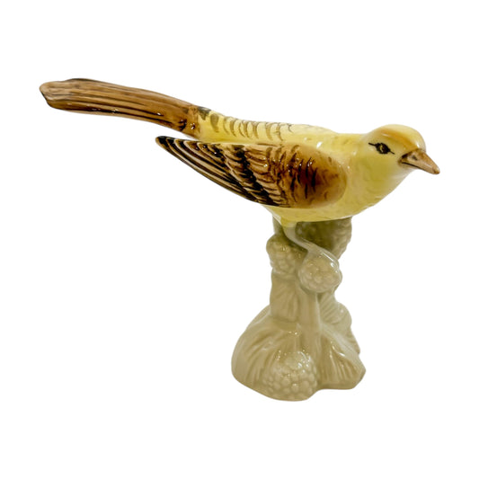 Vintage Czech Royal Dux porcelain yellow bird perched on branch figurine