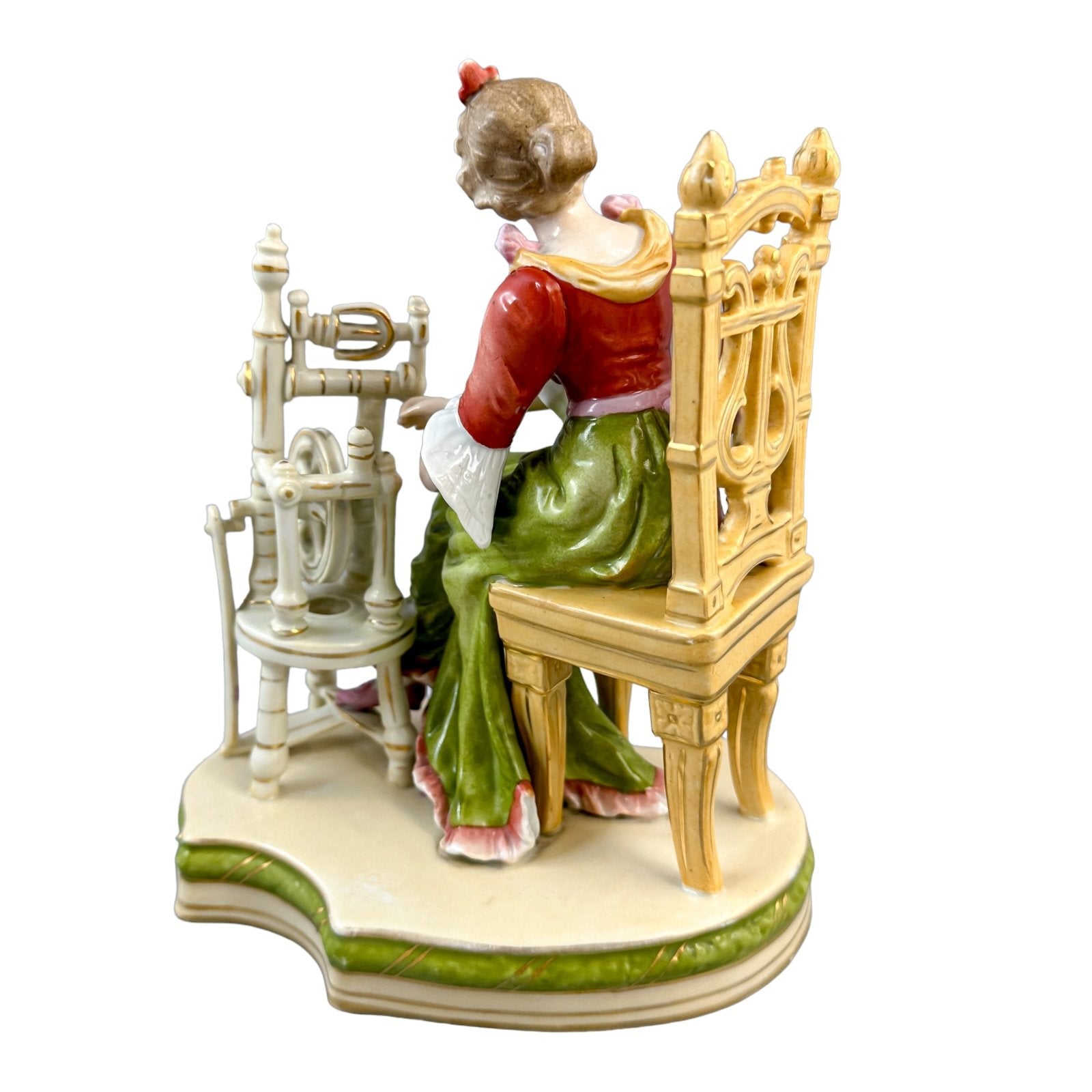 Sitzendorf porcelain figurine, "Woman at Spinning Wheel"