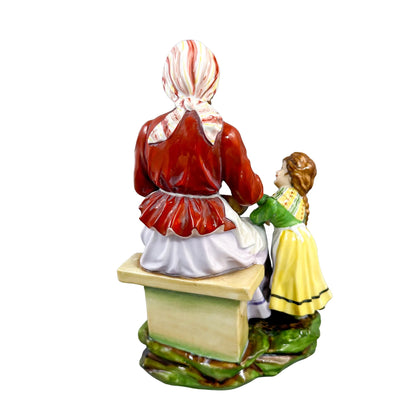 German 1890's Thuringian porcelain figurine of woman peeling potatoes