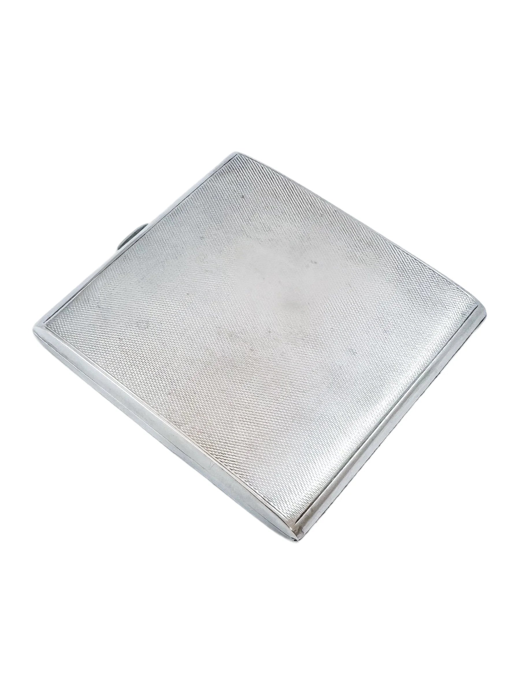 Large Art Deco George V engine-turned cigarette case with gold washed interior