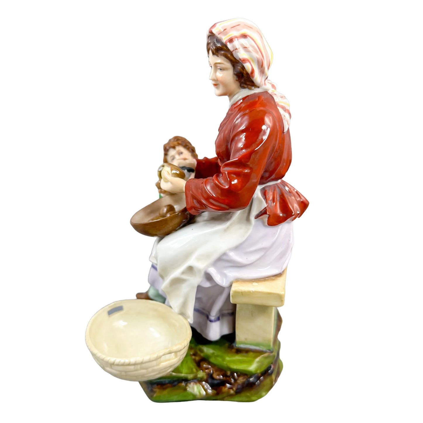 German 1890's Thuringian porcelain figurine of woman peeling potatoes