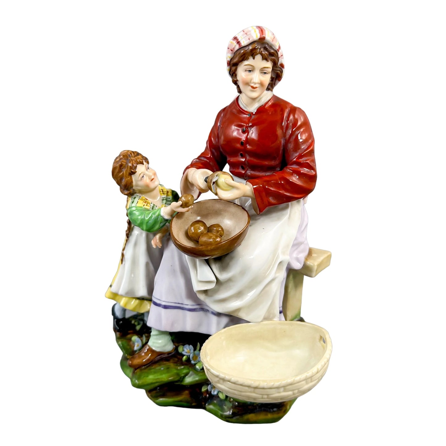 German 1890's Thuringian porcelain figurine of woman peeling potatoes