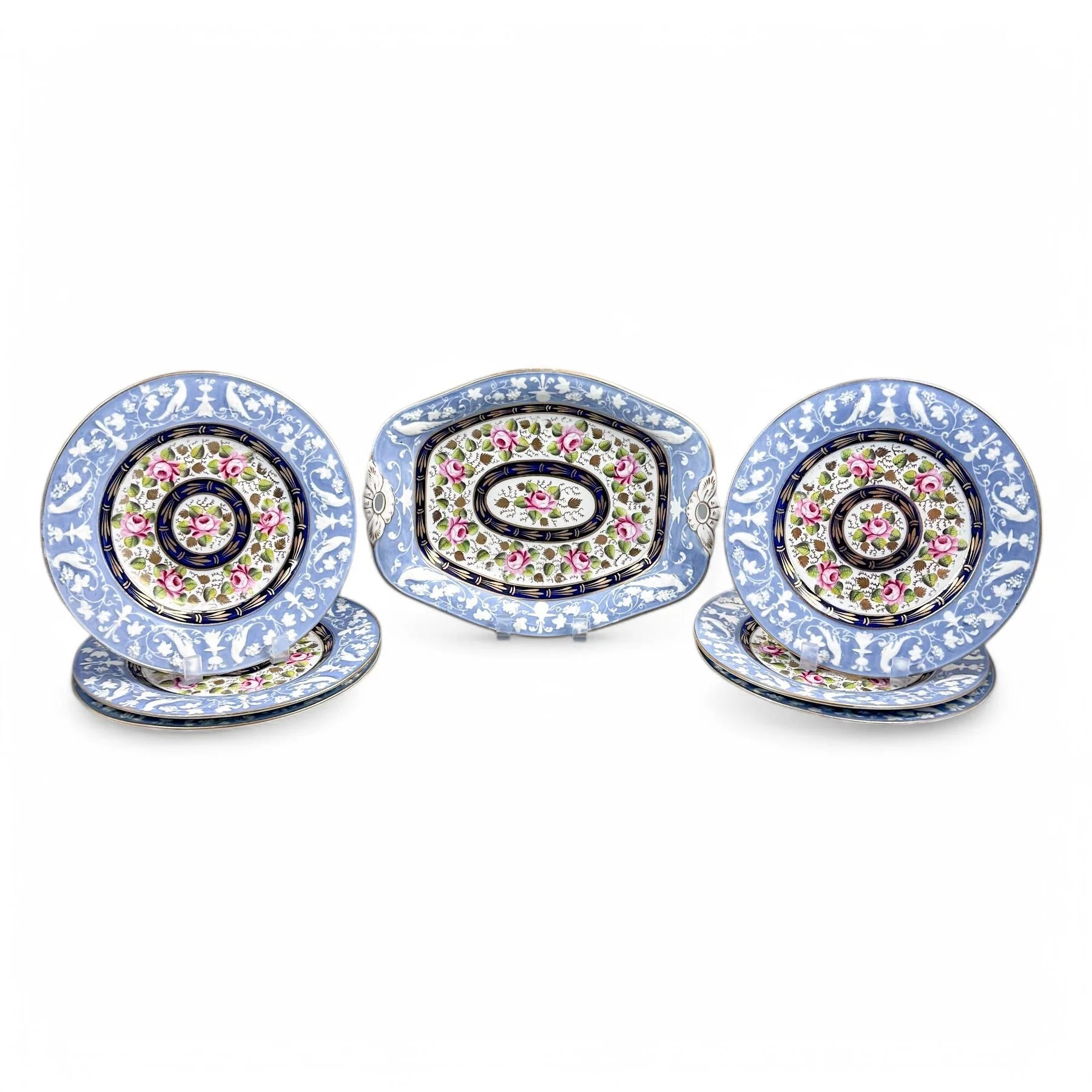 Rare New Hall Staffordshire hybrid porcelain dessert service with powder blue and rose decoration, circa 1820