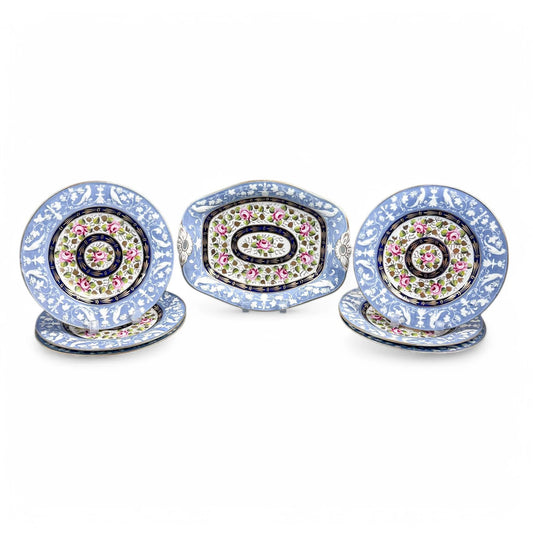 Rare New Hall Staffordshire hybrid porcelain dessert service with powder blue and rose decoration, circa 1820