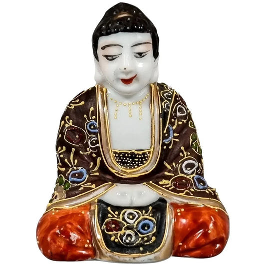 Meiji Japanese Kutani porcelain sitting Buddha figurine, enamel moriage by Dai Nippon Tsukuru