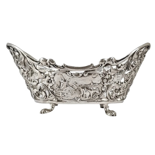 Bijkamp & Co Dutch silver bon bon pierced basket lion paw feet, village scenes and sugar tongs