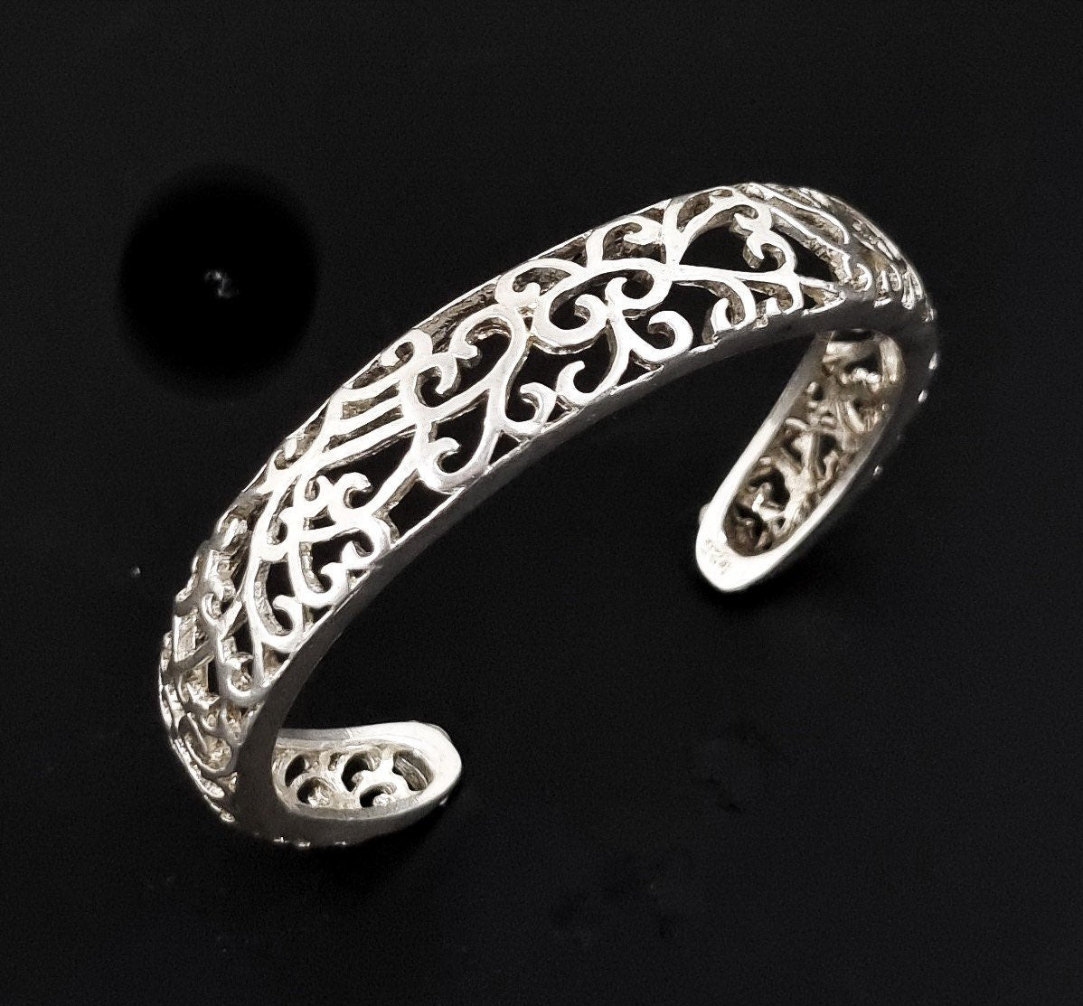 Vintage sterling silver cuff bracelet, intricate pierced scrolling design, USA, c. 1970s