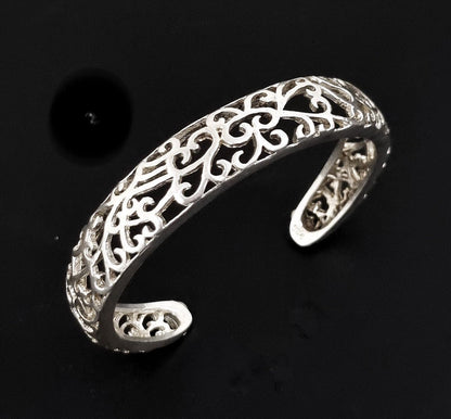 Vintage sterling silver cuff bracelet, intricate pierced scrolling design, USA, c. 1970s